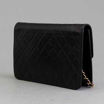 A black lambskin handbag by Chanel 1997-99.