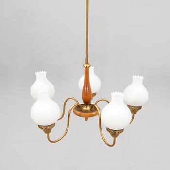 Taklampa 1900-talets mitt.