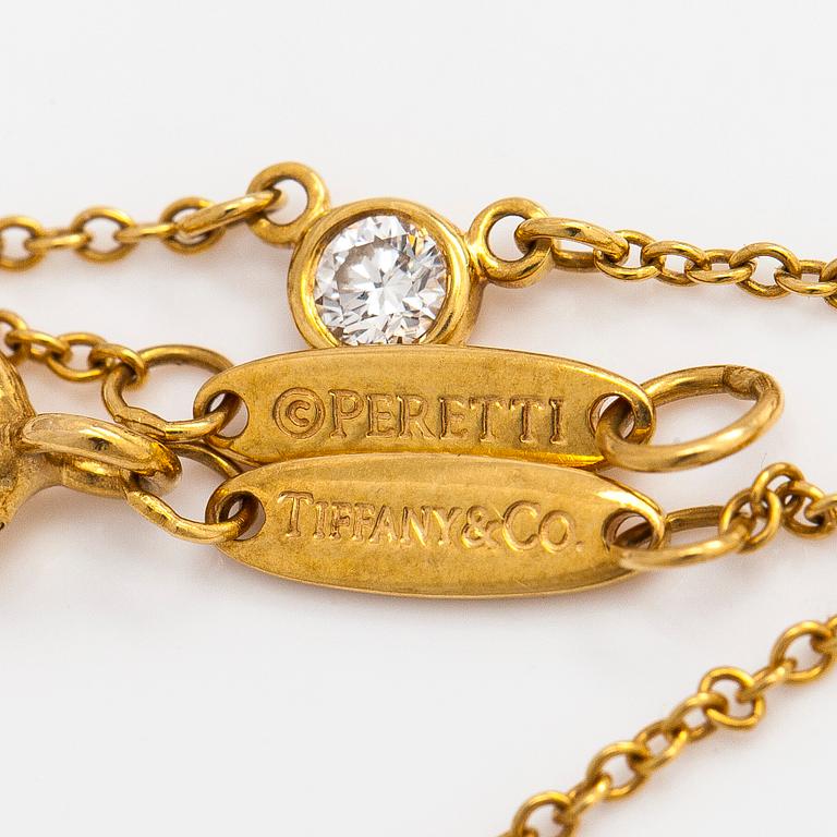 Tiffany & Co, Elsa Peretti, an 18K gold 'Diamonds by the Yard' necklace with a brilliant-cut diamond.