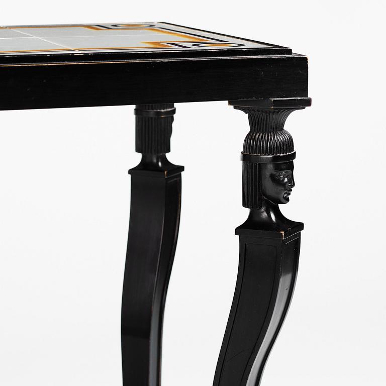 Axel Einar Hjorth, an ebonised oak Swedish Grace tiled top table, Nordiska Kompaniet 1931. Tile top by Edgar Böckman.