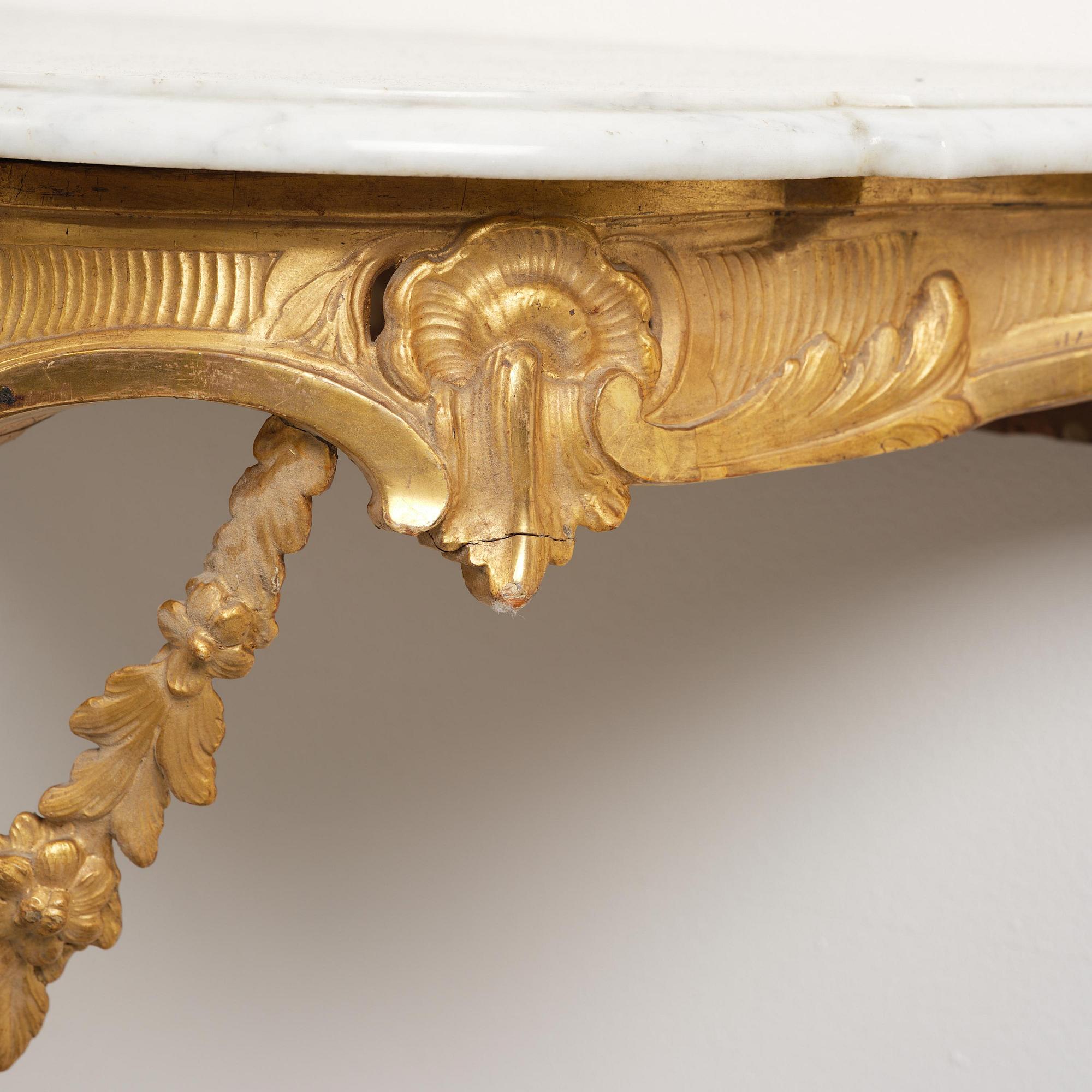 A rococo giltwood and marble console table, Stockholm, later part 18th century.
