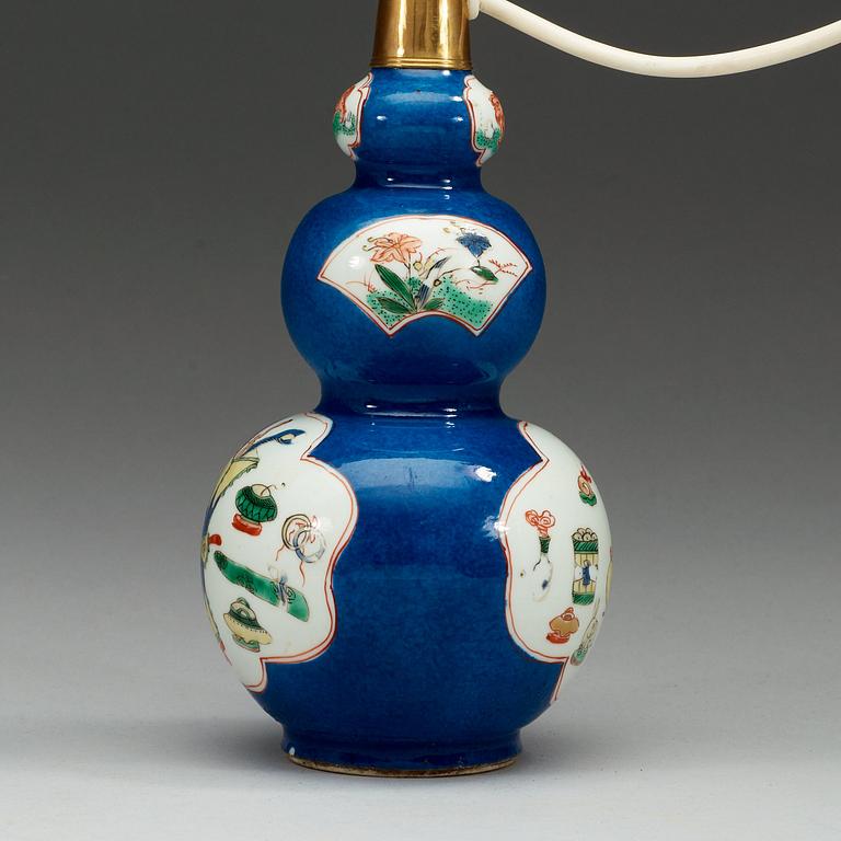 A powder blue and famille verte kalebas vase, Qing dynasty 18th Century.