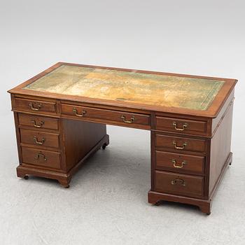 A 20th century writing desk, England.