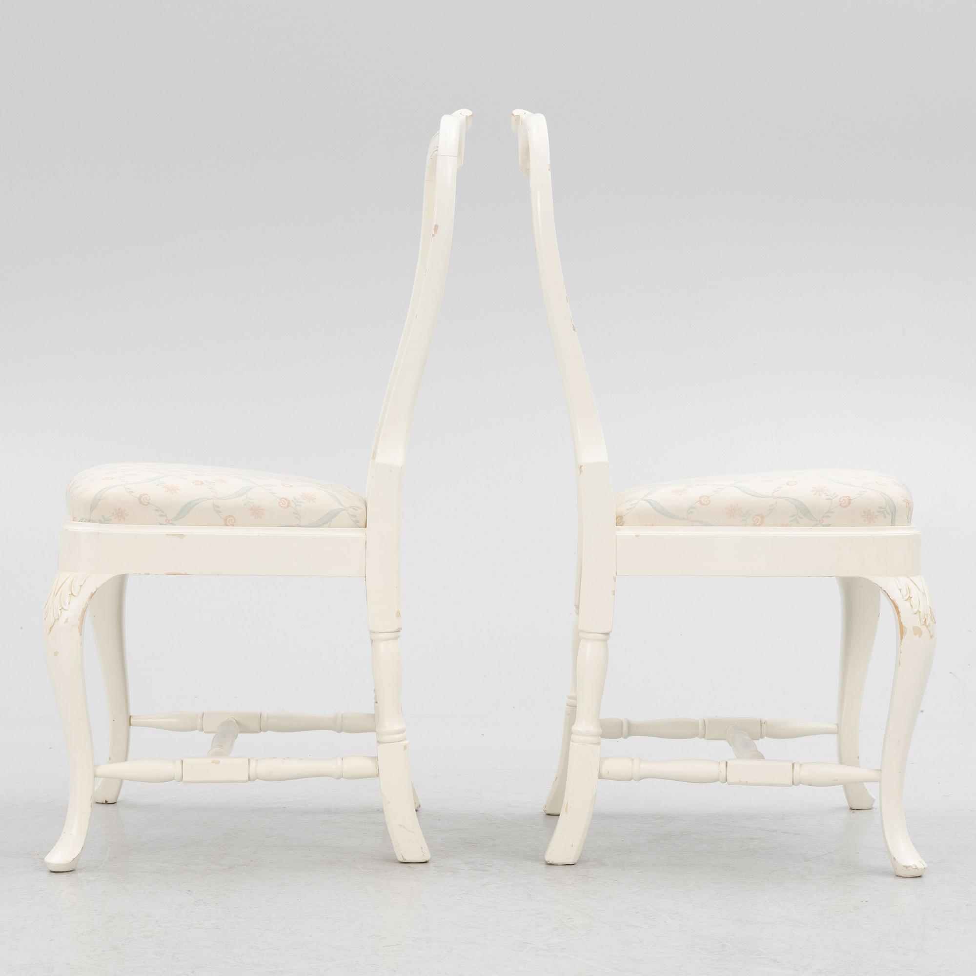 A Rococo style dining table with eight chairs, second half of the 20th century.