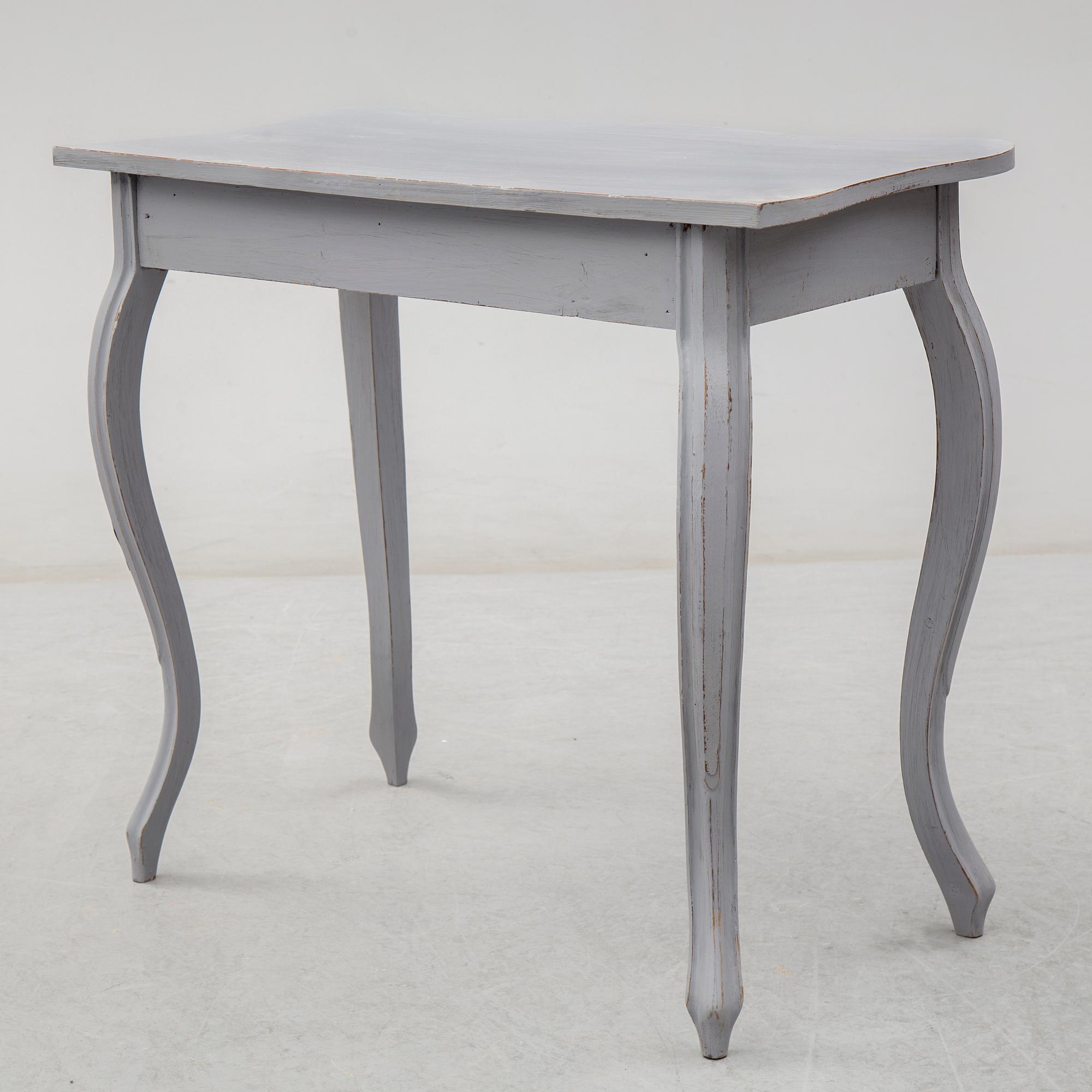 A circa 1900 Rococo style writing desk.