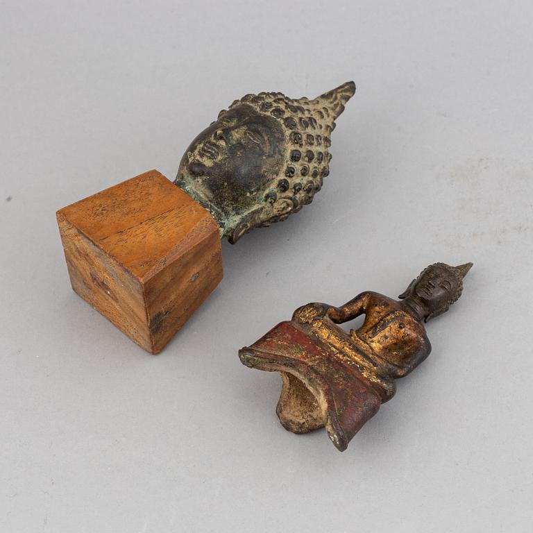 A Thai seated bronze buddha and a bronze buddha head, 18th/19th century.