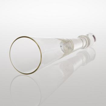 A GLASS CANDLESTICK, label marked Nuutajärvi Notsjö Boutique.