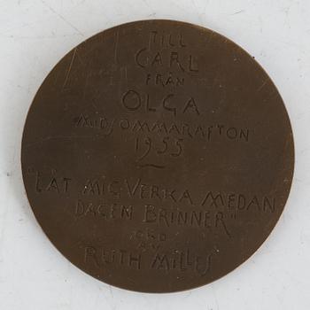 Olga Milles, portrait medallion.