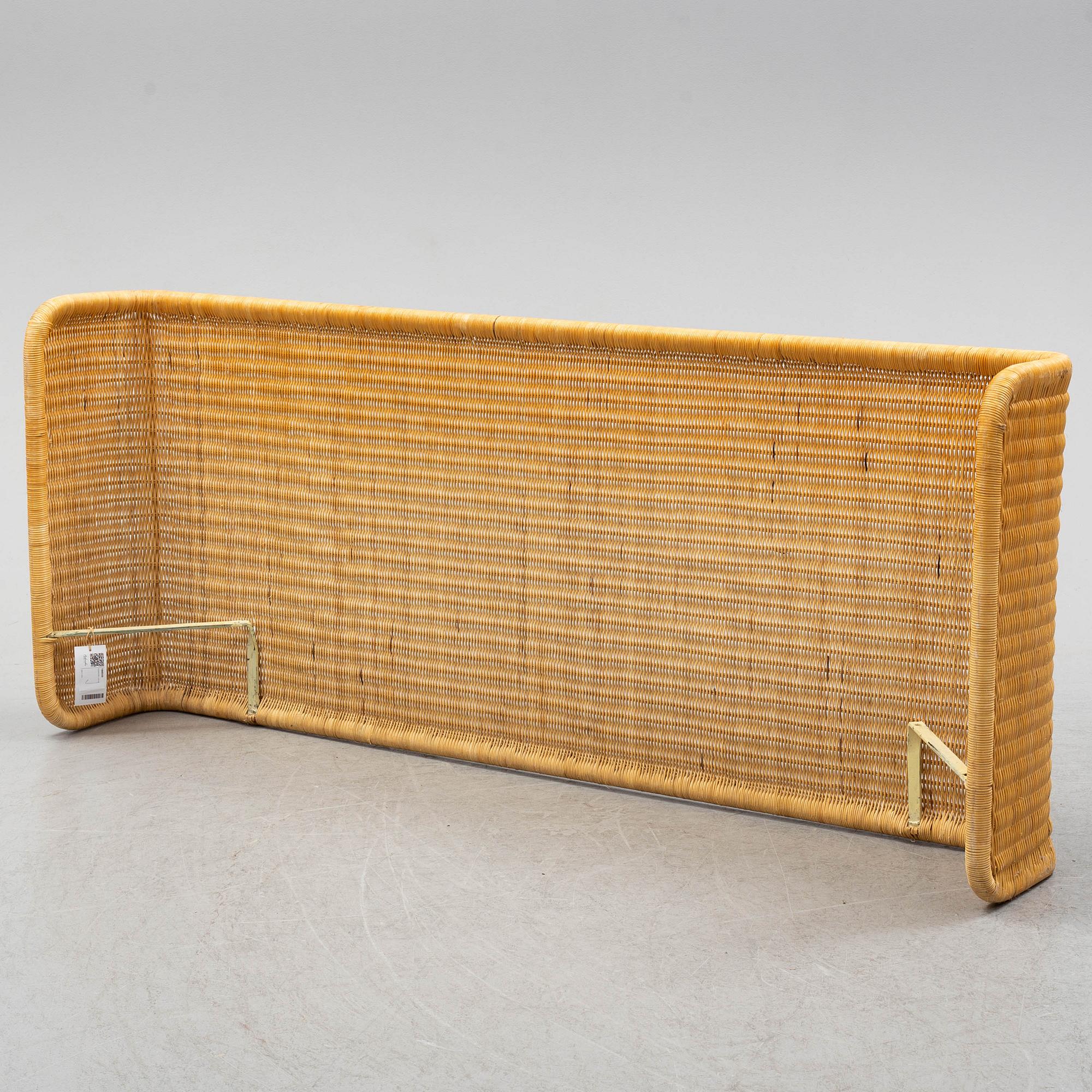 A late 20th century rattan bedside.