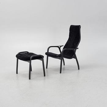 Yngve Ekström, a 'Lamino' armchair with stool, Swedese, Sweden, 2019.