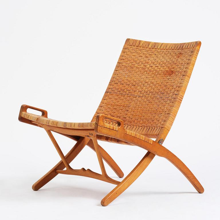 Hans J. Wegner, a foldable easy chair model 512, Johannes Hansen, Copenhagen, 1950s-60s.