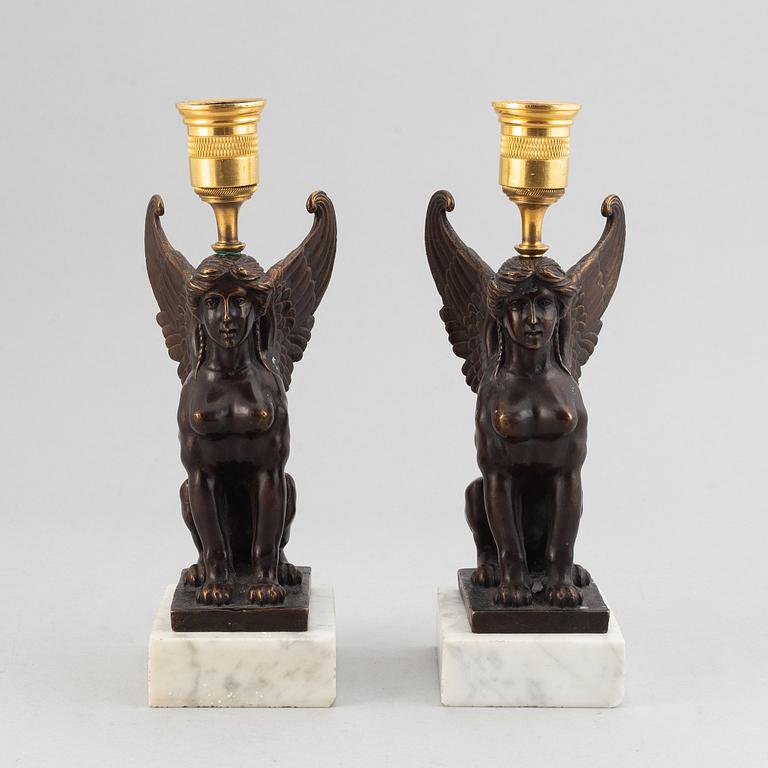 A pair of presumably Russian Empire candlesticks, early 19th Century.