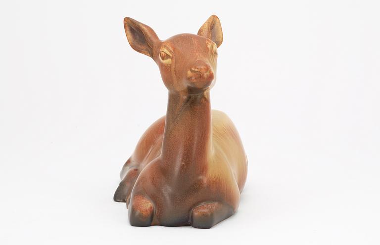 A Gunnar Nylund stoneware figure of a deer, Rörstrand.