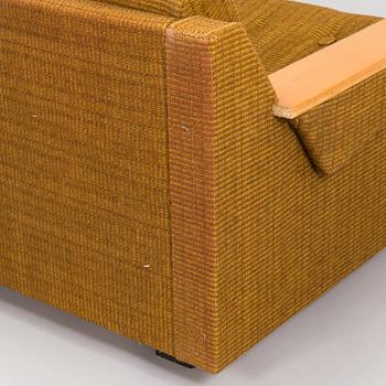 A pair of 1970s armchairs.