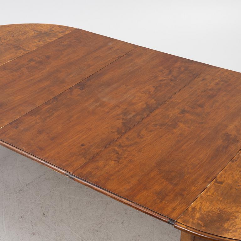 A dining table, late 19th Century.