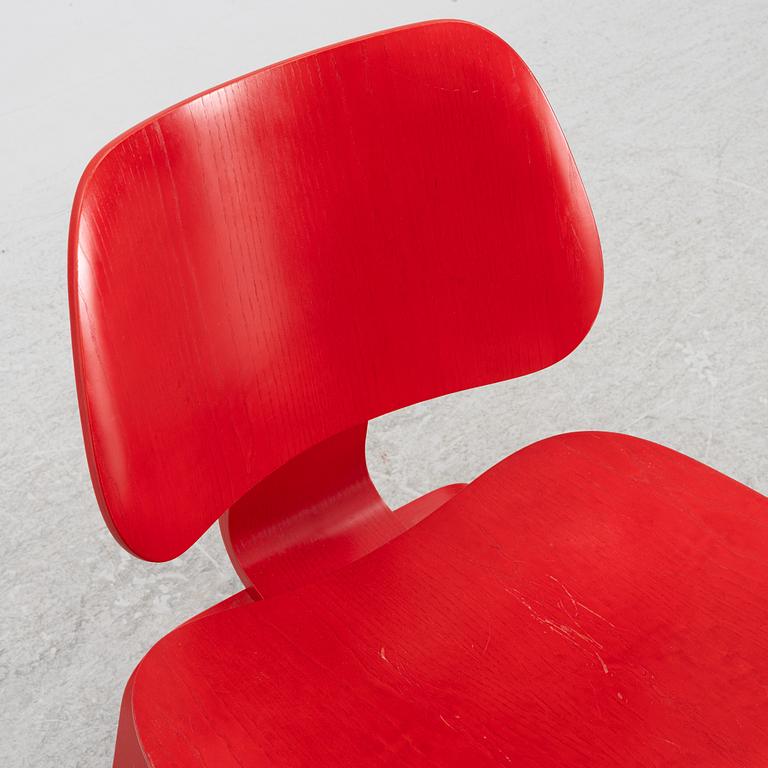 Charles & Ray Eames, a 'LCW' chair, Vitra, dated 2003.