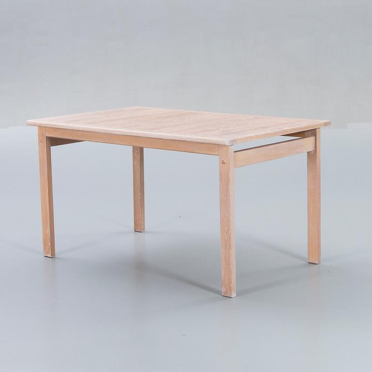 A Danish 1960s dining table and 6 chairs,