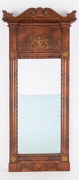 A mirror and console table, first half of the 19th century.