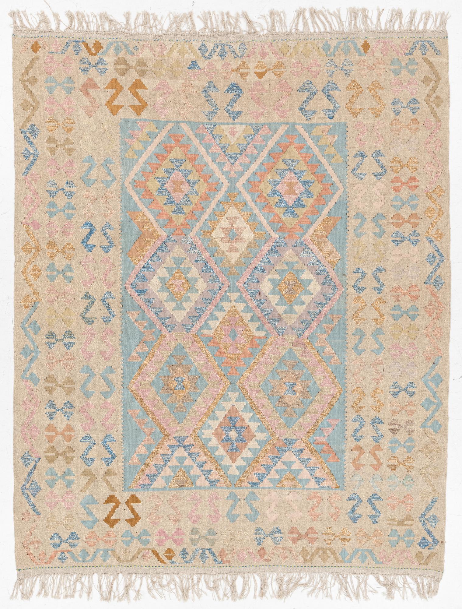 A Kelim carpet, c. 252 x 200 cm.