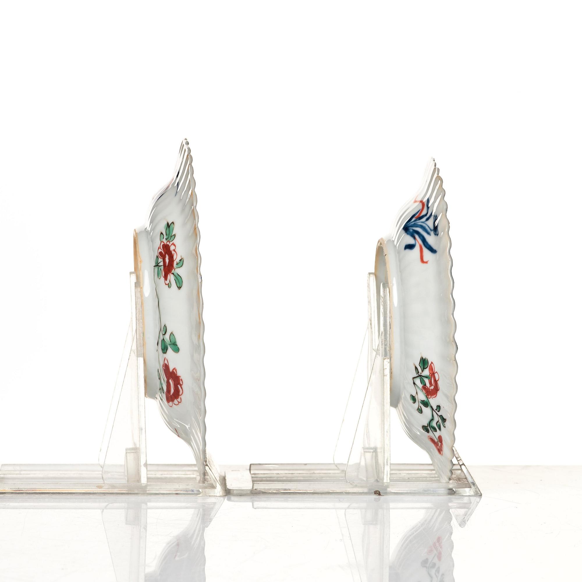 A pair of famille verte cups with stands, Qing dynasty, Kangxi (1662-1722).