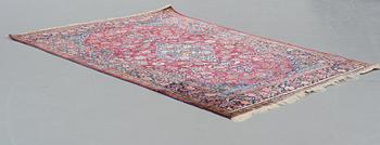 A RUG, a semi-antique silk Kashan, ca 185-198 x 125-132,5 cm.

 
125-132,5 cm.