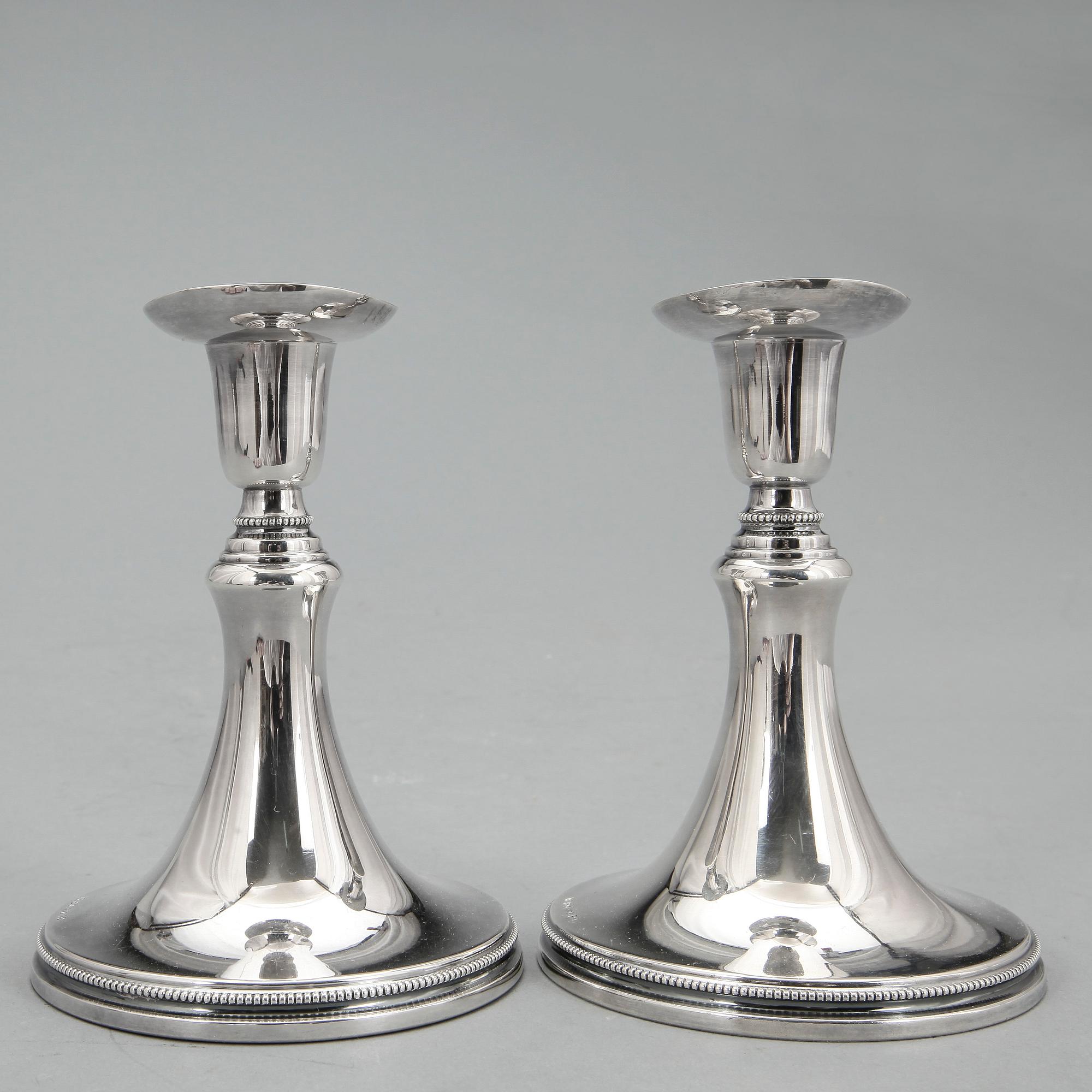 LJUSSTAKAR, ett par, silver, Eric Löfman, MGAB, Uppsala, 1956. Total vikt ca 469 g.