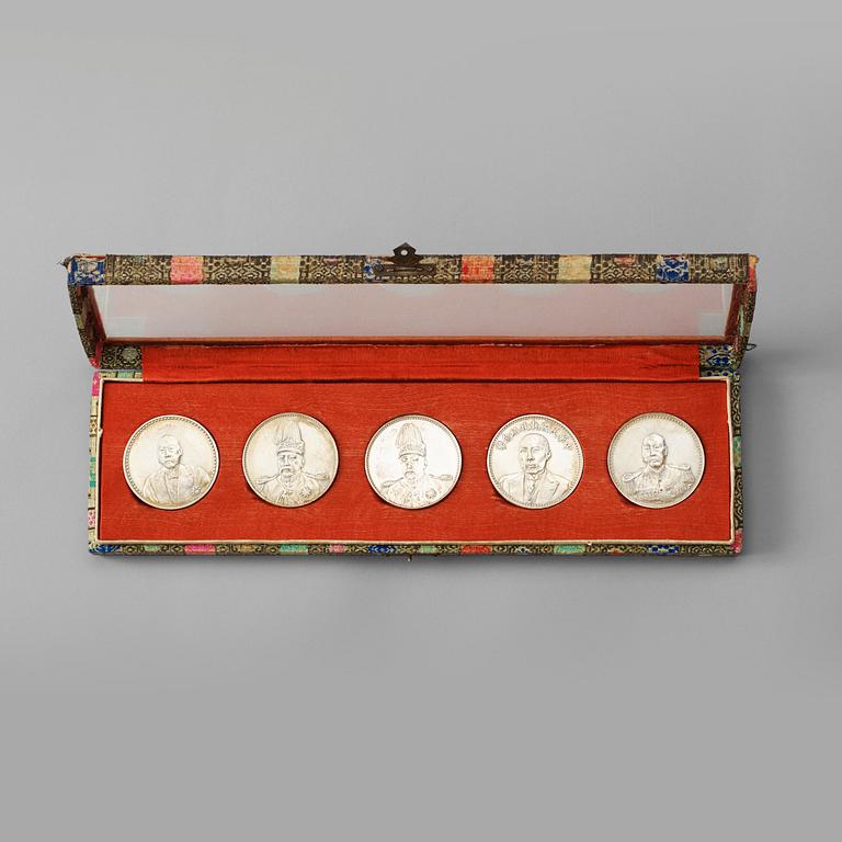 A box with five silver coins, Republic, early 20th Century.