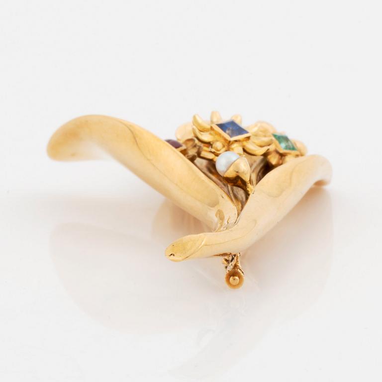 An 18K gold Borgila brooch set with coloured gemstones and a pearl.