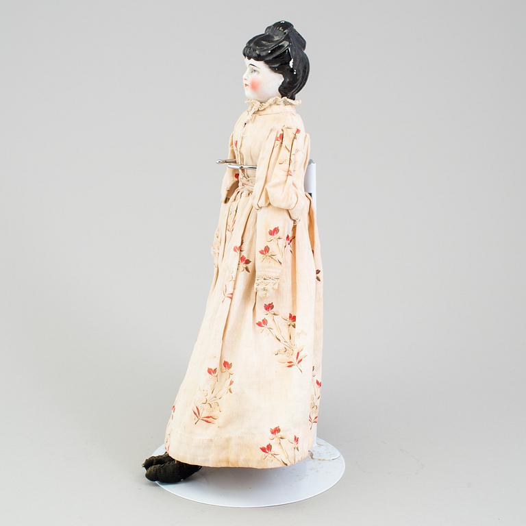 A porcelain doll, about 1900.