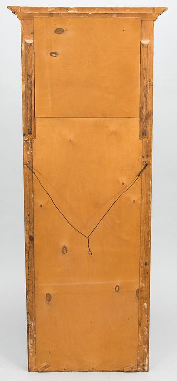 An early 20th century mirror with console table in late Gustavian style.