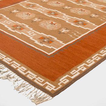 A finnish flat weave carpet 'What shall I do?', manufacturer Laura Korpikaivo-Tamminen. Circa 350 x 260 cm.