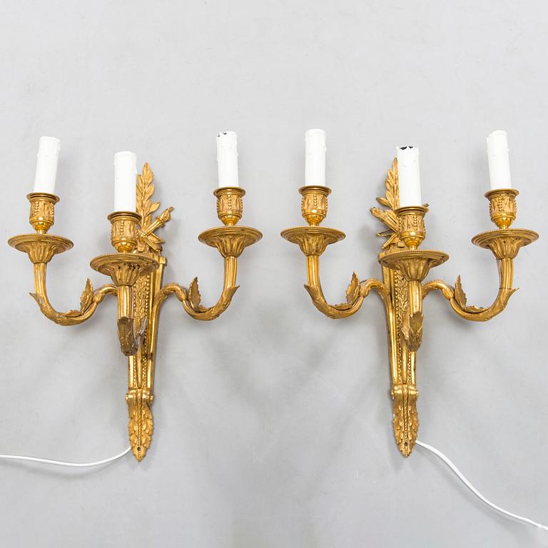 A pair of wall appliqués, Louis XVI style, late 19th century.