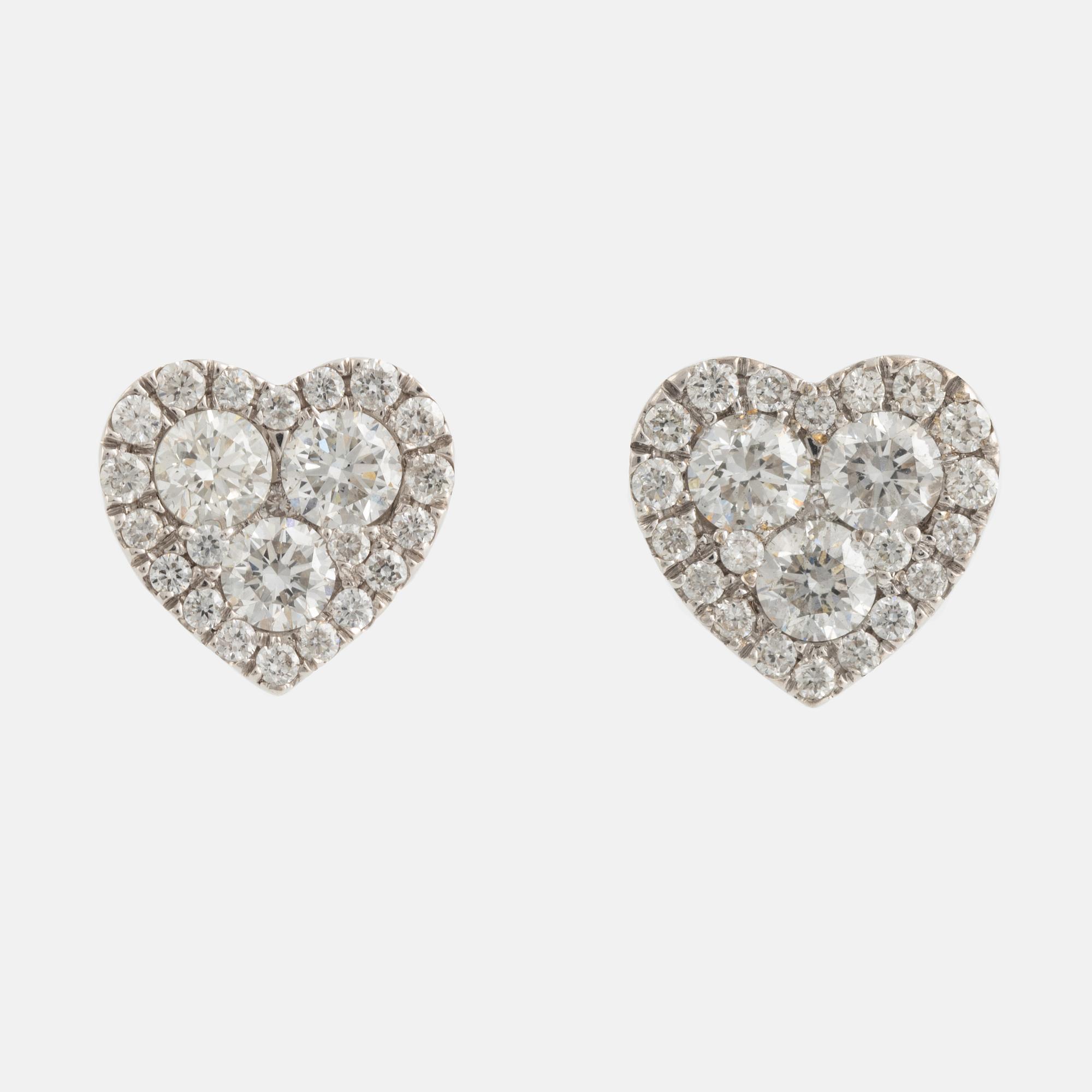 Heart shaped brilliant cut diamond earrings.