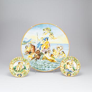 A large majolica 'istoriato' dish and two plates, 20th Century.