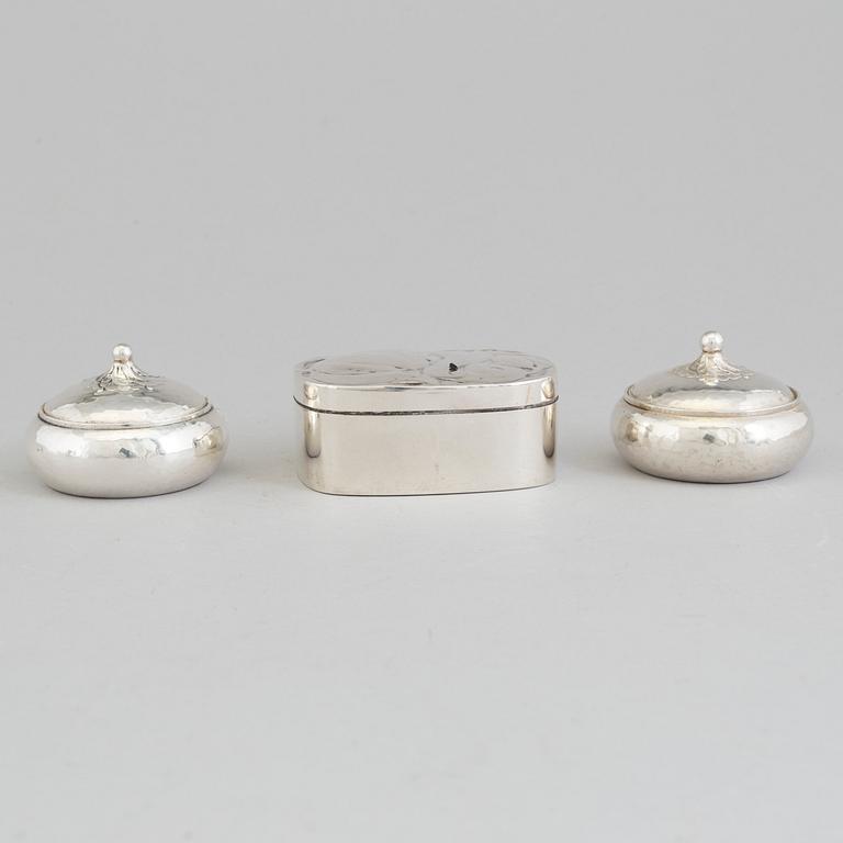 Three Art Nouveau silver and parcel-gilt snuff boxes, Stockholm and Copenhagen 1917-1919.