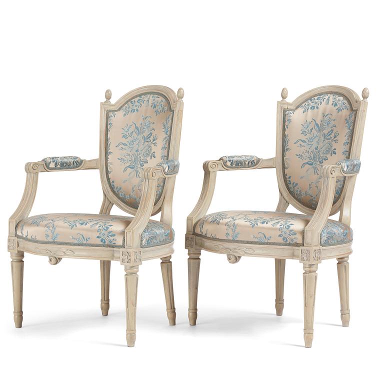 A pair of carved Gustavian chairs by J. Mansnerus (master 1756-1779).
