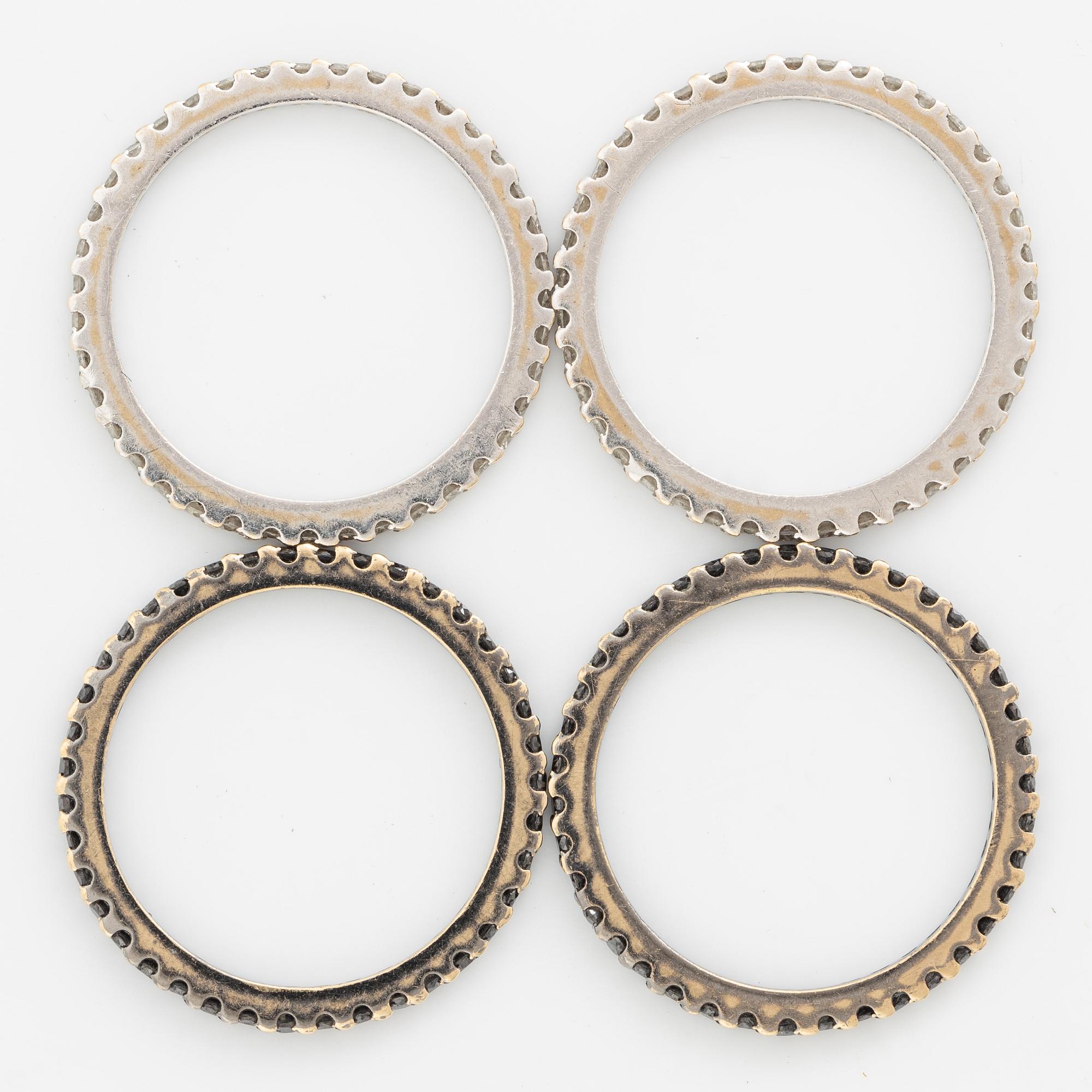 Rings 4 pcs, 18K white gold with brilliant-cut diamonds.