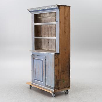 A painted folk-art cupboard, early 19th century.