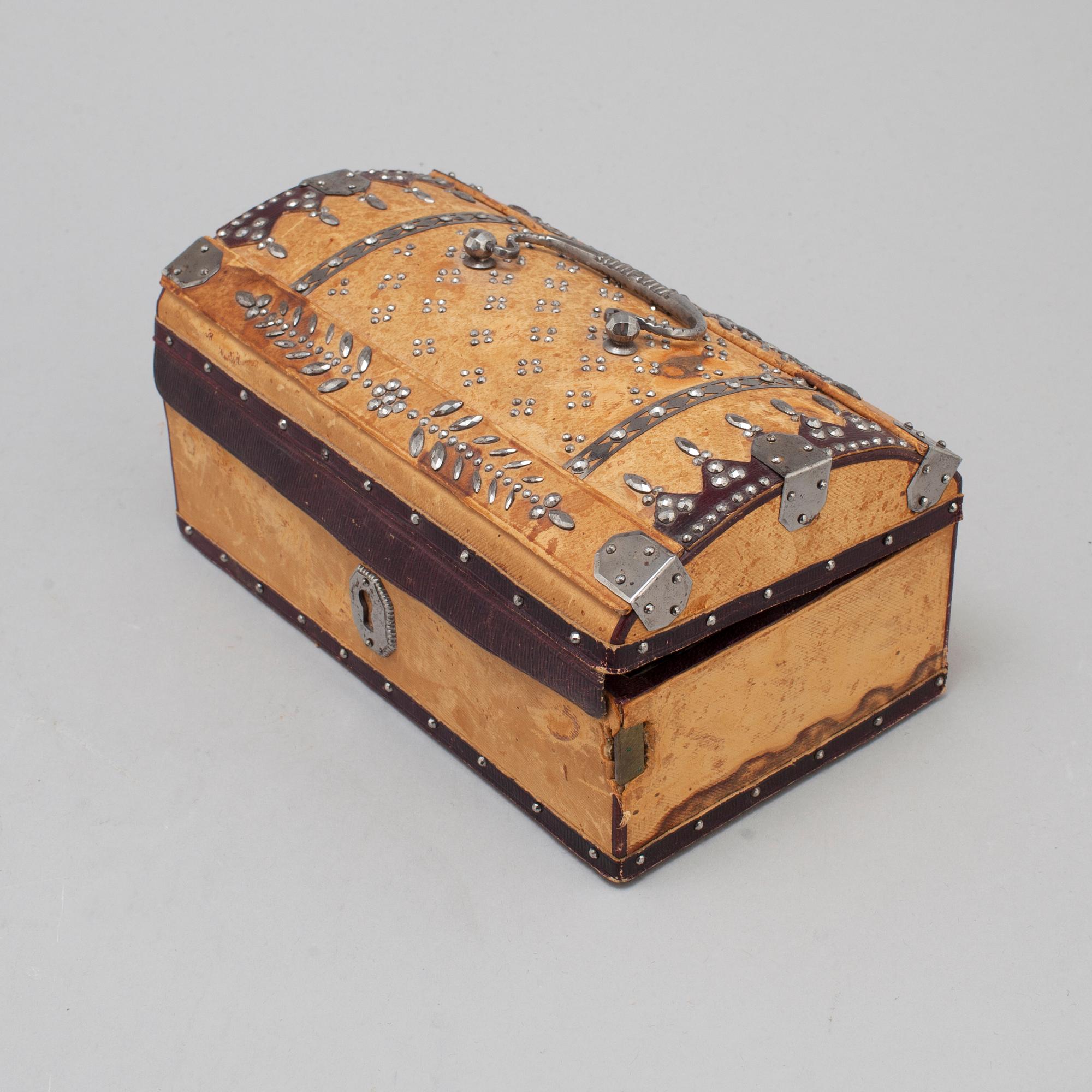 19th century leather box with steel decorations.