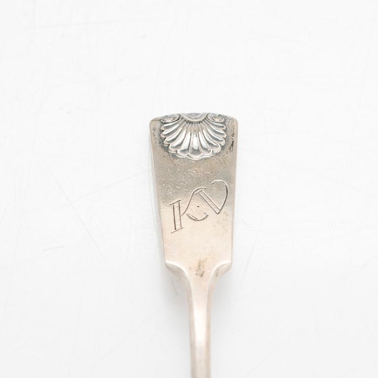 Silver spoons, 29 pcs, and sugar tongs with shell motif mostly by Kuopion Kultaseppä oy, Kuopio, 1919-53.