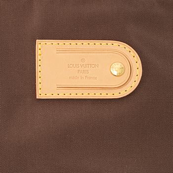 Louis Vuitton, a monogram canvas 'Pégase 65' suitcase.