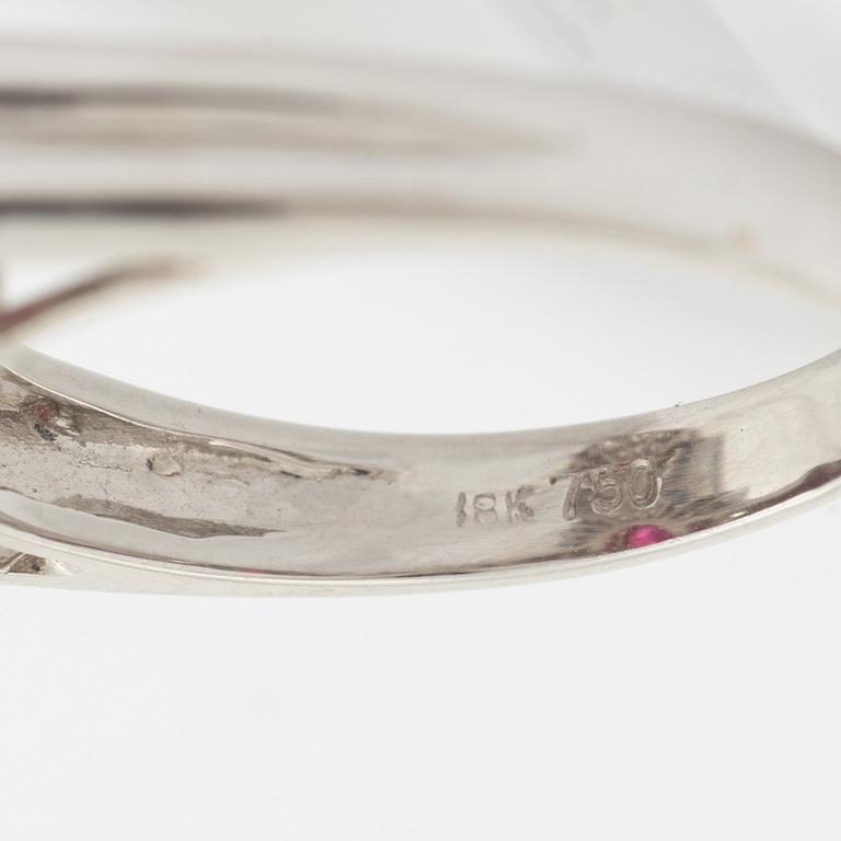Ruby, baguette- and brilliant cut diamond ring.