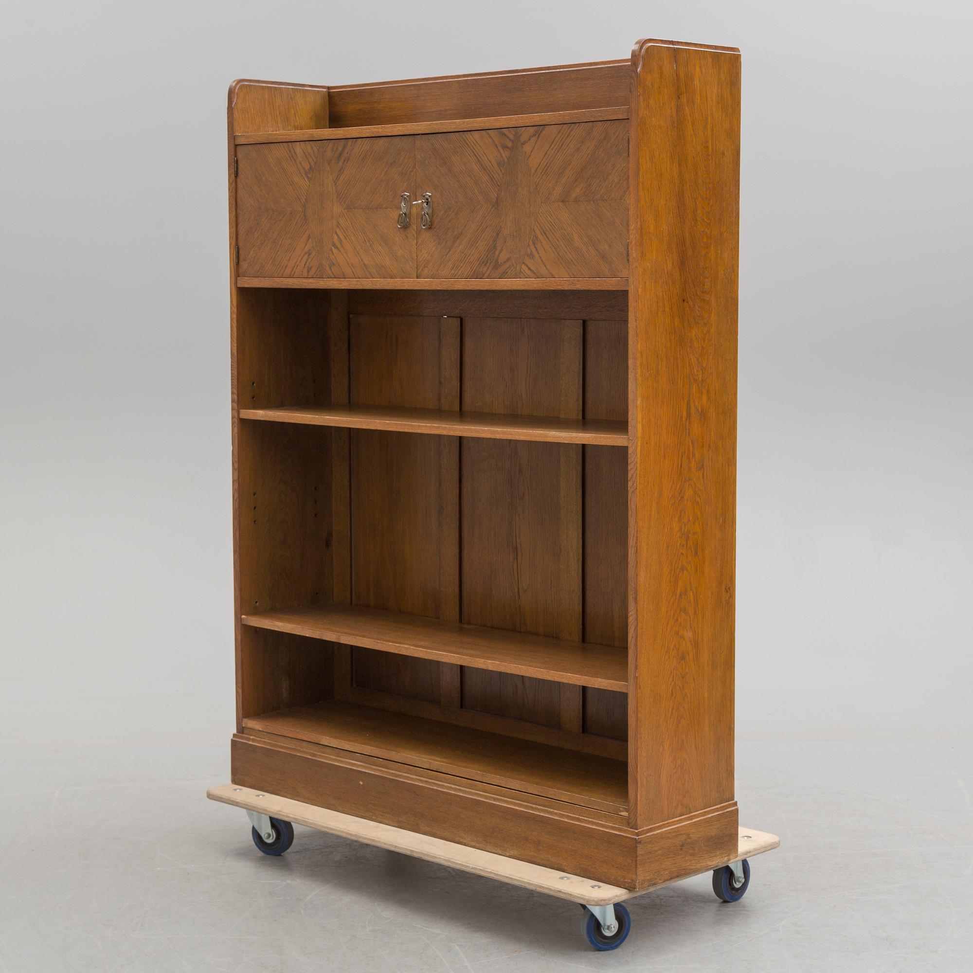 An early 20th century bookcase /  cabinet.