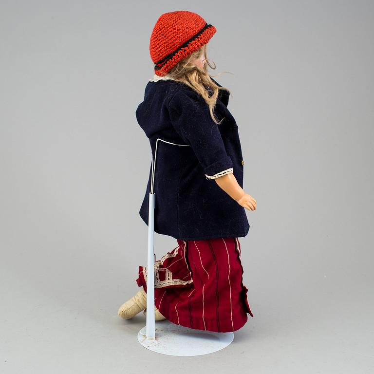 An Armand Marseille 3200 DEP Made in Germany bisque head doll.