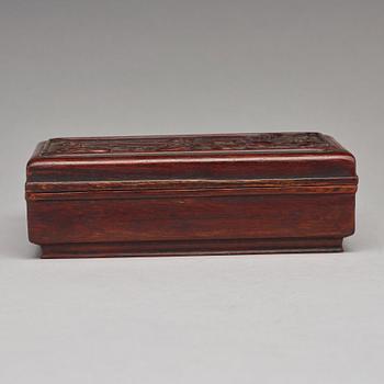 A Chinese wooden box, circa 1900.