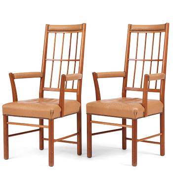 321. Josef Frank, a pair of mid-Century mahogany chairs, Svenskt Tenn Sweden, model nr 652.