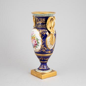 An Empire style porcelain urn decorated by Atelier Le Tallec, France, mid 20th century.