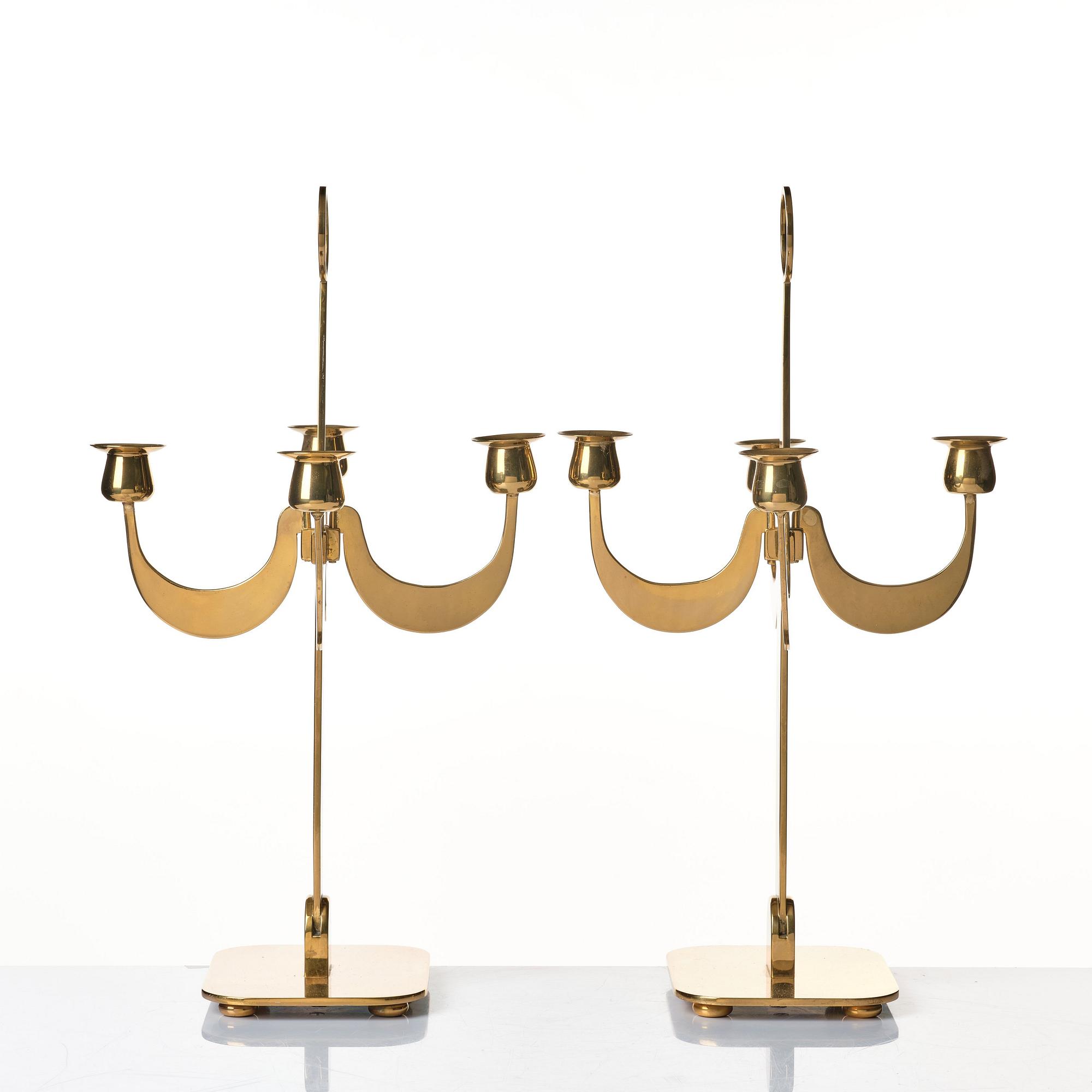 Josef Frank, a pair of brass candelabra by Svenskt Tenn, Sweden 1950's, model nr 2663.