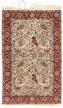 An oriental, figural rug, c. 230 x 145 cm.