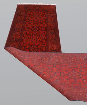 An Afghan runner, so called Khan Mohammadi, ca 297 x 78 cm.